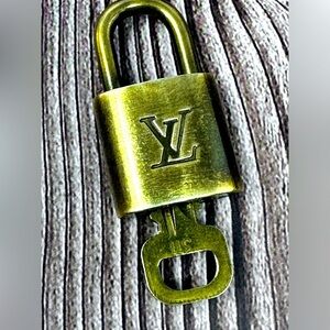 100% Authentic and pre loved Louis Vuitton - Gold Lock and Key set #311​​